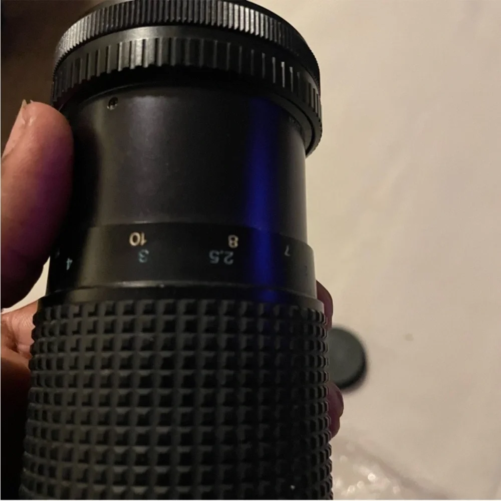 TOKINA Black Zoom Lens with Essential Accessories